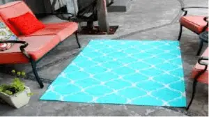 how to keep outdoor rugs in place on concrete