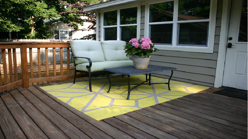 Will An Outdoor Rug Damage A Wood Deck, How To Keep Outdoor Rugs In Place On Concrete